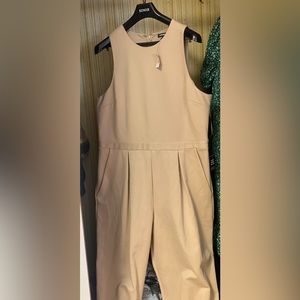 Brand new never worn elegant tan long express jumper. Size xl